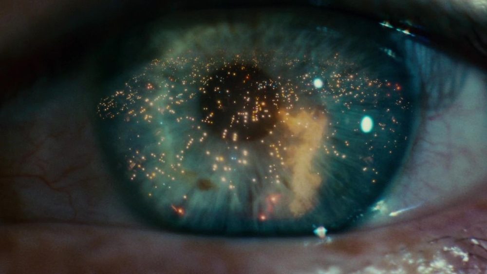 Blade Runner 1982 Deckard wandering rainy neon-lit future Los Angeles