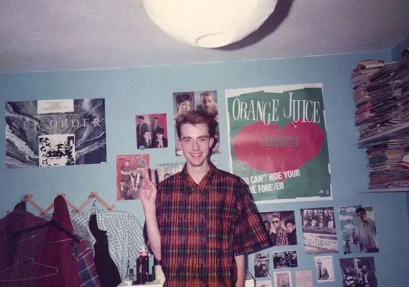 80s teen bedroom covered in band posters before the internet