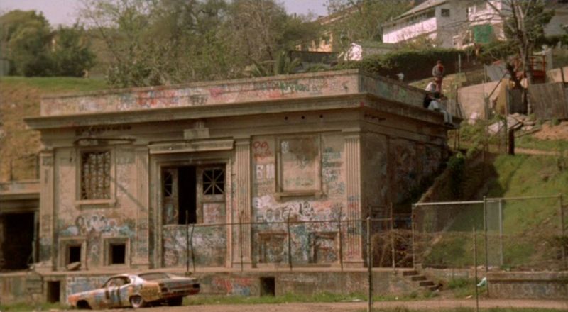 Graffiti-covered Belmont Tunnel substation in Colors 1988 — 21st Street gang territory