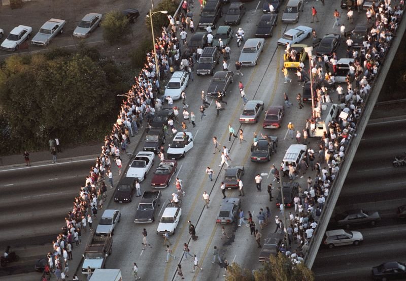 Crowds spill onto the 405 freeway as the OJ Simpson Bronco chase passes on June 17 1994