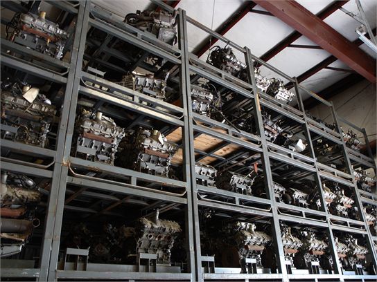 DeLorean PRV V6 engine parts warehouse storage racks DMC inventory