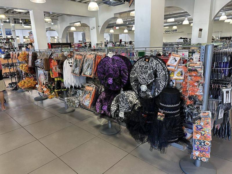 Goodwill thrift store interior with racks of clothing where grunge fashion lives