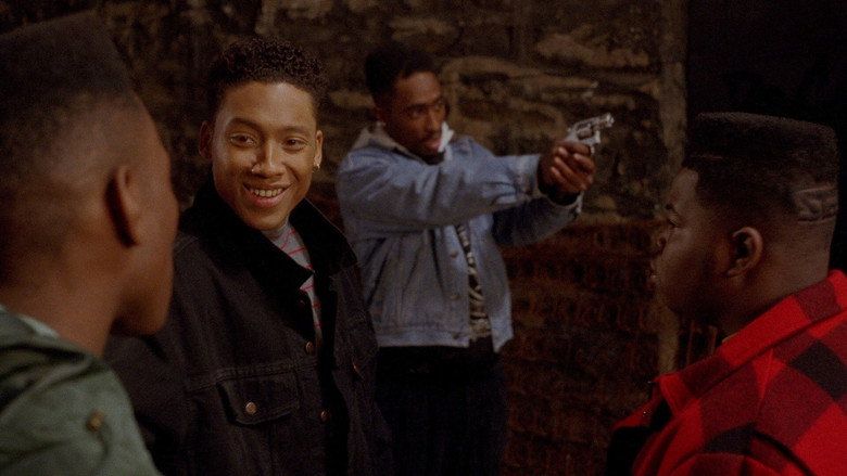 Bishop points the gun in a basement scene from Juice 1992