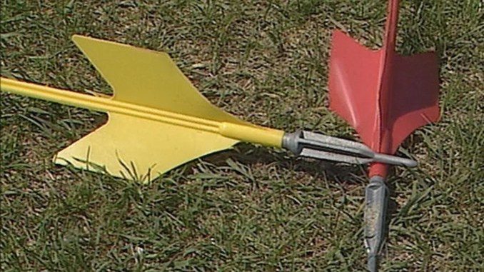 Metal-tipped Jarts lawn darts in the grass — banned in 1988 after killing children