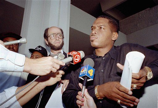 2 live crew leader Luther Campbell holding the obscenity court order outside the Fort Lauderdale courthouse in 1990