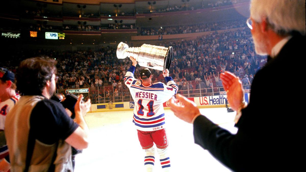 Mark Messier hoists the Stanley Cup at Madison Square Garden on June 14, 1994
