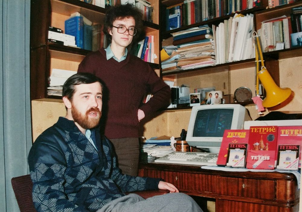 Pajitnov and Gerasimov in Soviet office with Tetris boxes and Electronika computer