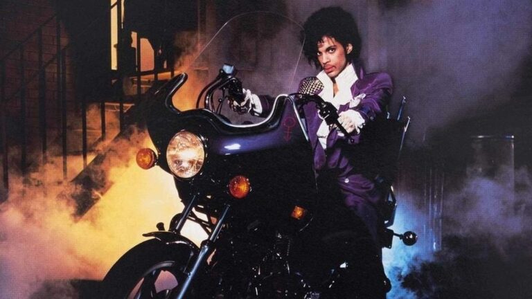 Purple Rain movie album cover with Prince on his motorcycle, 1984