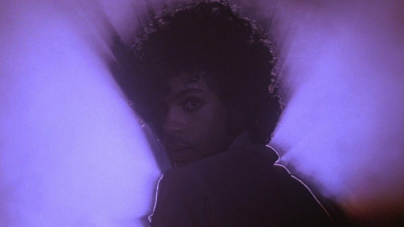 Prince lit in purple haze in the Purple Rain movie