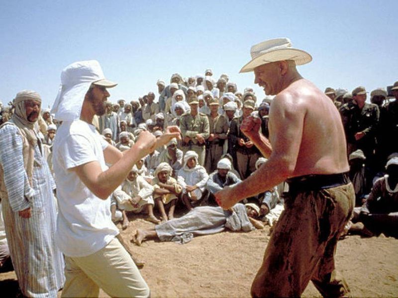 Harrison Ford fights Pat Roach on the flying wing set during Raiders of the Lost Ark filming