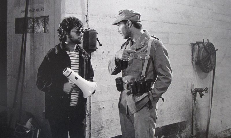 Steven Spielberg directs Harrison Ford on the Cairo street set of Raiders of the Lost Ark