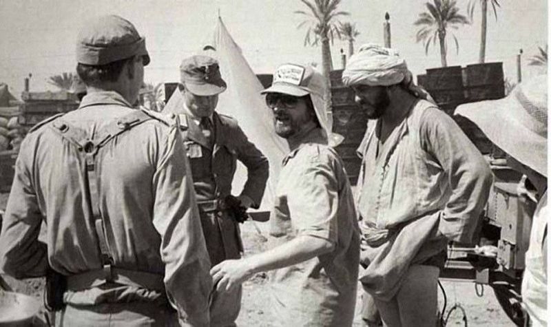 Steven Spielberg in the field with the Raiders of the Lost Ark Tunisia crew, 1981