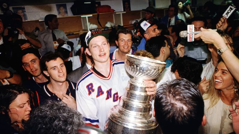 New York Rangers celebrate at Madison Square Garden after the final horn of Game 7 on June 14, 1994