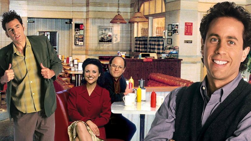 Seinfeld cast in a Monk's Cafe diner booth scene