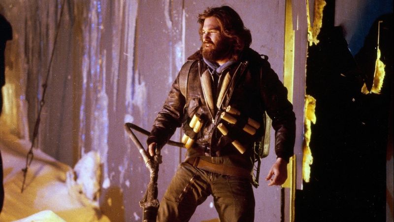 Kurt Russell as MacReady in John Carpenter The Thing 1982 with flamethrower