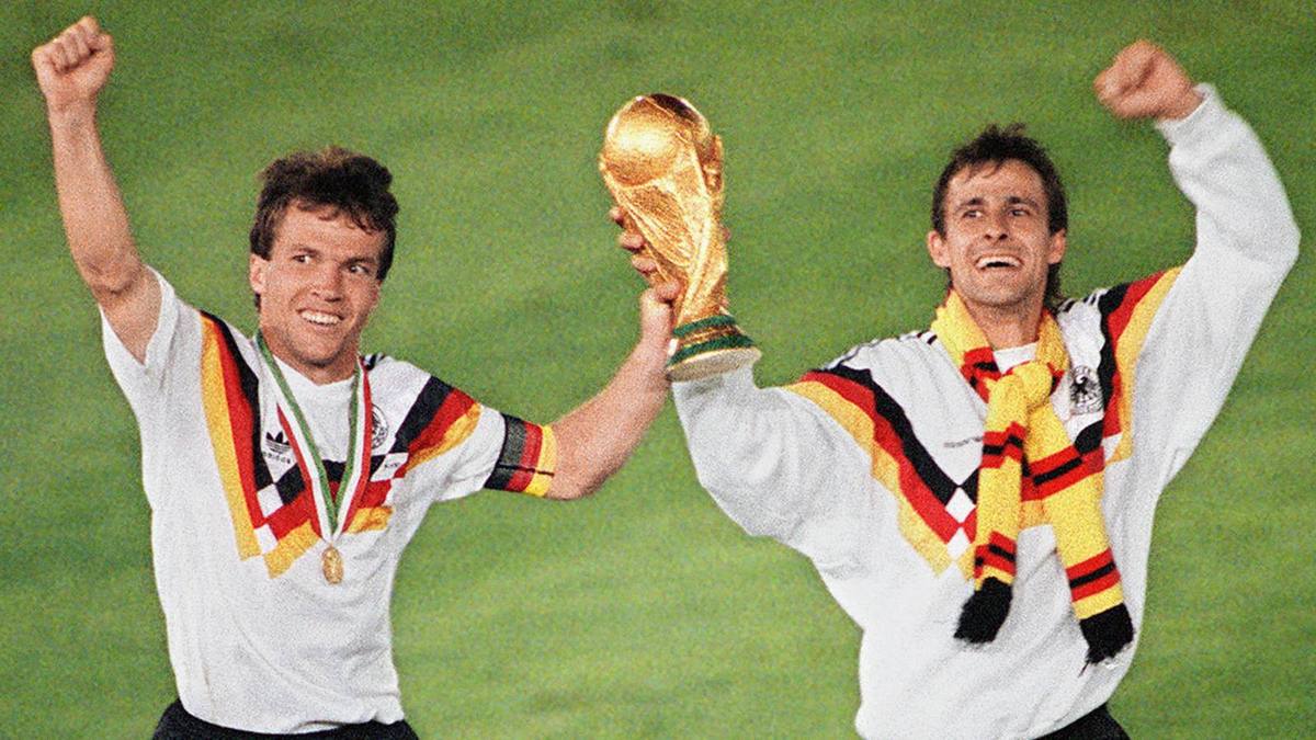 Lothar Matthaus lifts the trophy after the 1990 World Cup Final