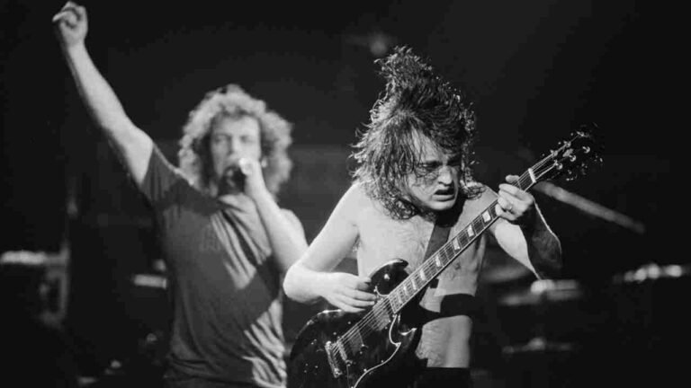 Brian Johnson and Angus Young performing together on the Back in Black tour, 1980