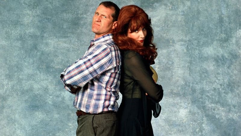 Al Bundy and Peg Bundy back-to-back promotional photo married with children