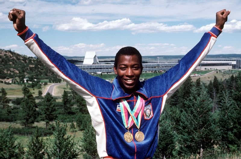 Alonzo Babers holding his two gold medals at the 1984 Los Angeles Olympics