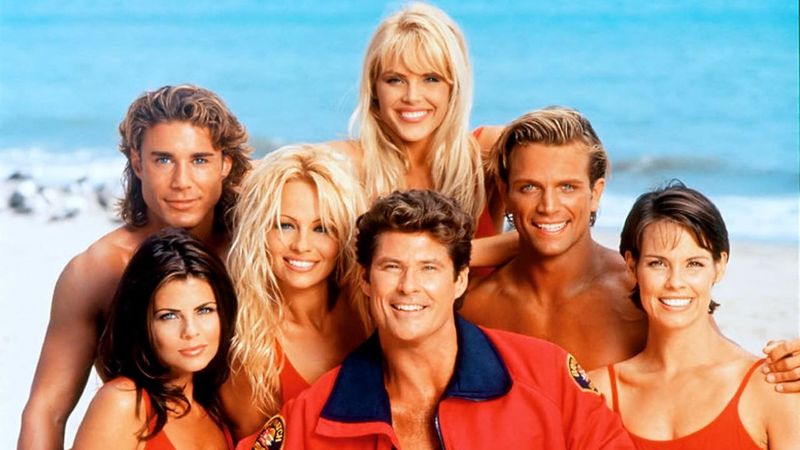 Baywatch TV show cast including Pamela Anderson and David Hasselhoff on the beach