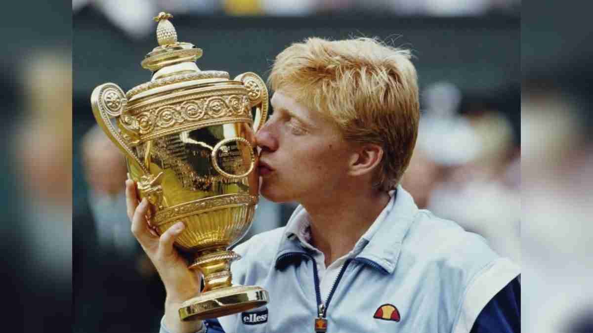 Boris Becker kisses the trophy after winning Wimbledon on July 7 1985