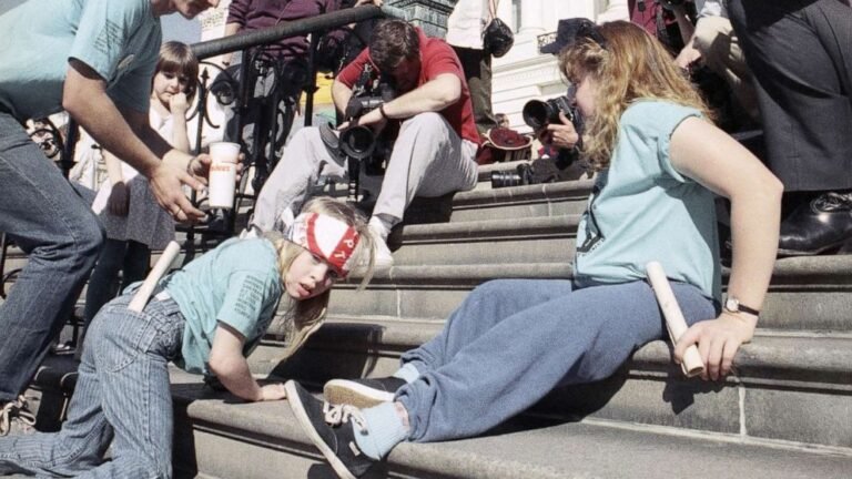 Jennifer Keelan leads the Capitol Crawl on March 12, 1990, crawling up Capitol steps to push for the ADA