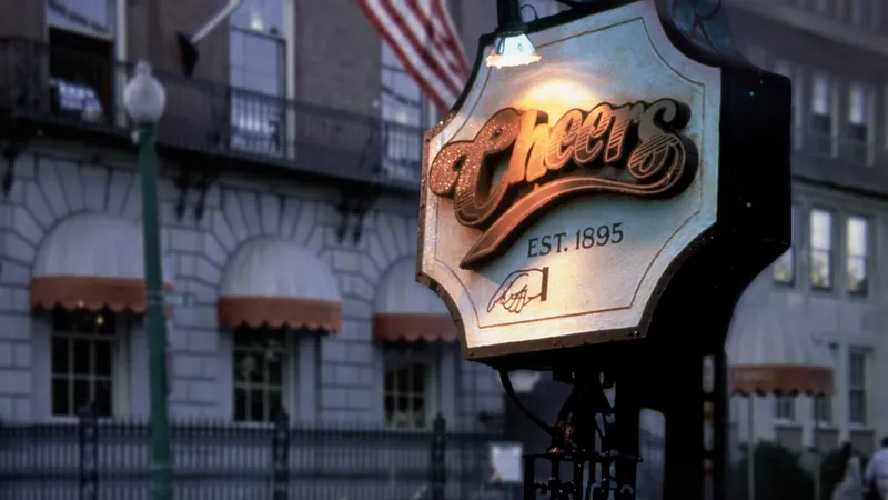 Cheers bar sign on a Boston street