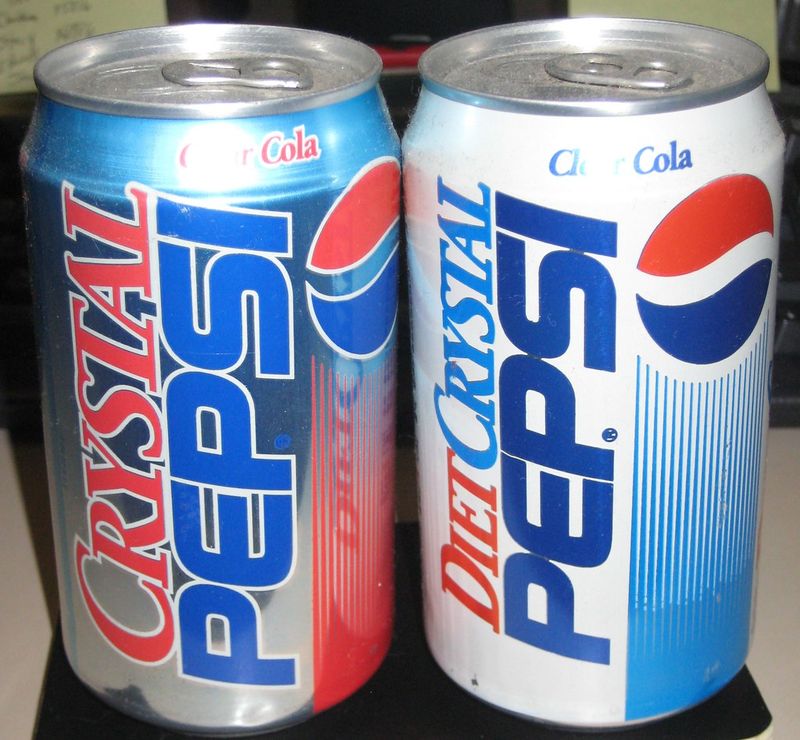 Close-up of original 1990s Crystal Pepsi clear cola cans