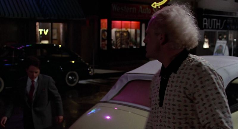 Doc Brown with the DeLorean in 1955 in Back to the Future