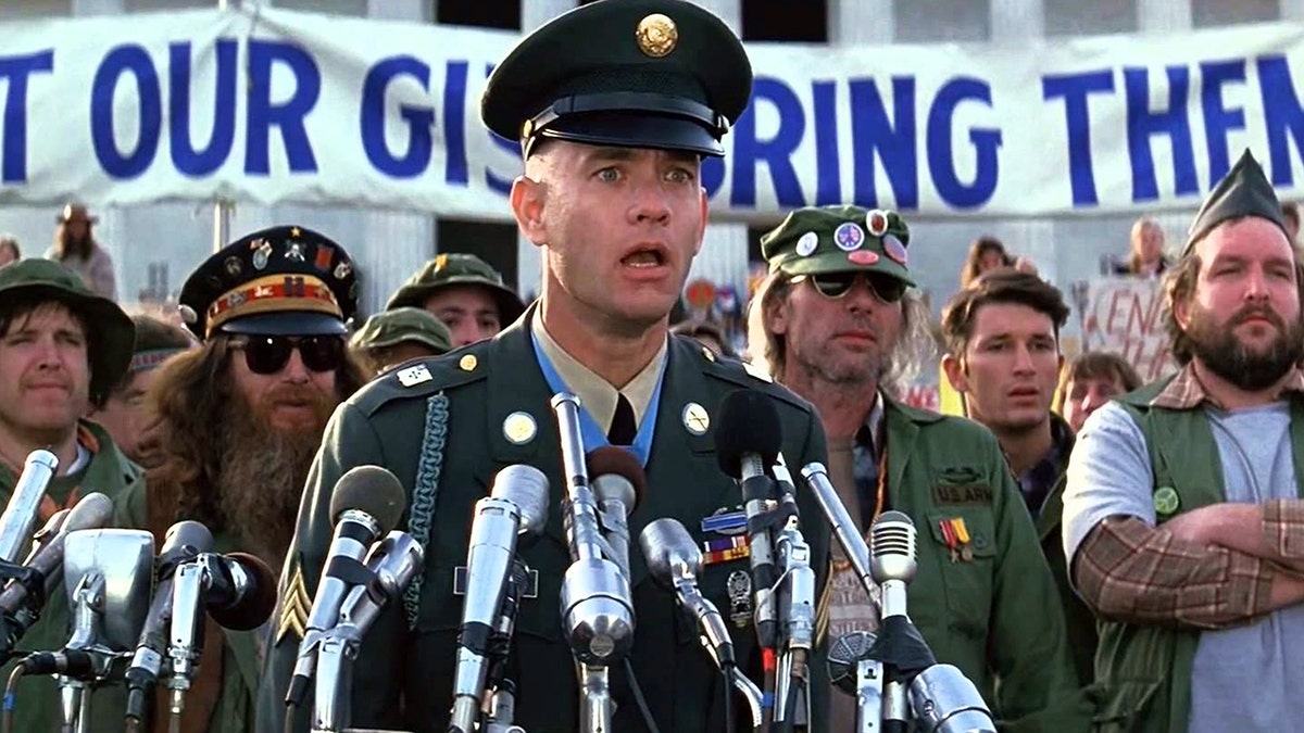 Tom Hanks as Forrest Gump in Army uniform at the 1994 film's March on Washington scene