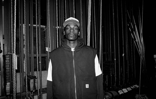 Rapper Snoop Doggy Dogg poses for photos backstage at the Regal Theater in Chicago, Illinois in January 1993.