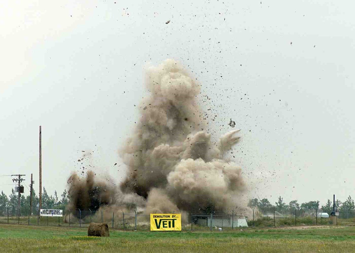 Minuteman II missile silo being destroyed under START treaty verification requirements — the concrete silo covers were blasted off to prove decommissioning
