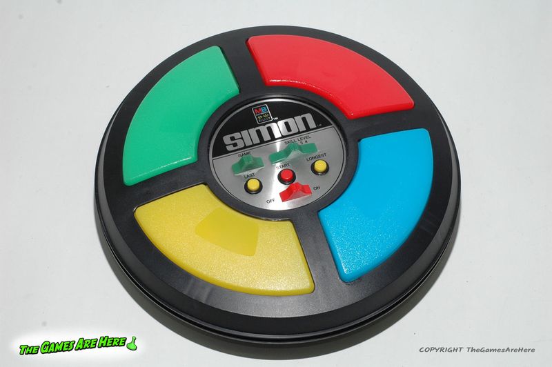 Simon game four color buttons close up