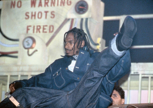 Snoop Dogg performs when the Death Row Records label assembles at The Source Awards, held at The Paramount Theater at Madison