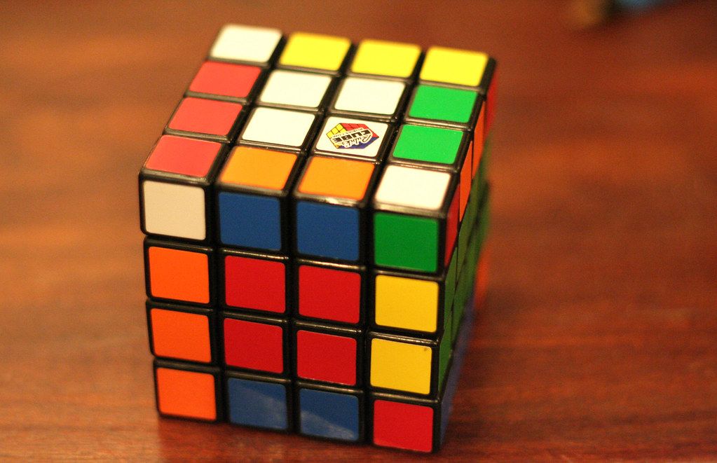 A 4x4 Rubik's Cube, one of the many variants of the original puzzle