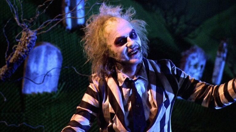 Michael Keaton as Beetlejuice in his iconic black and white striped suit, 1988 film