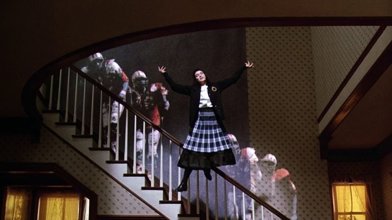 Winona Ryder as Lydia Deetz on the staircase in Beetlejuice 1988