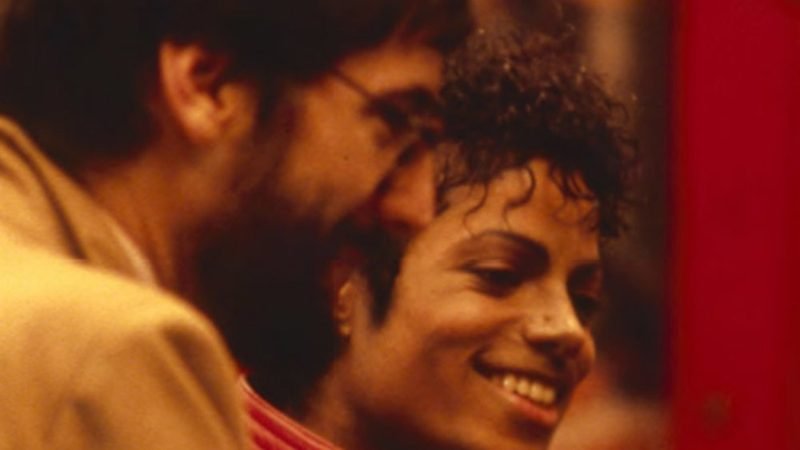 Michael Jackson smiling with director John Landis on the set of Thriller 1983