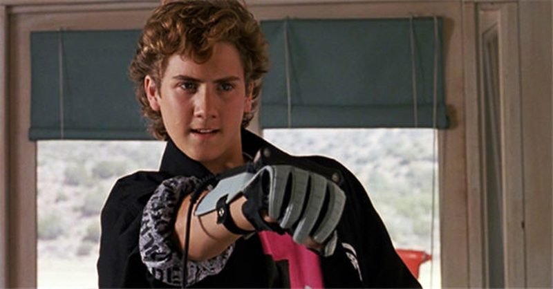 Lucas holding up the Nintendo Power Glove in The Wizard 1989 movie