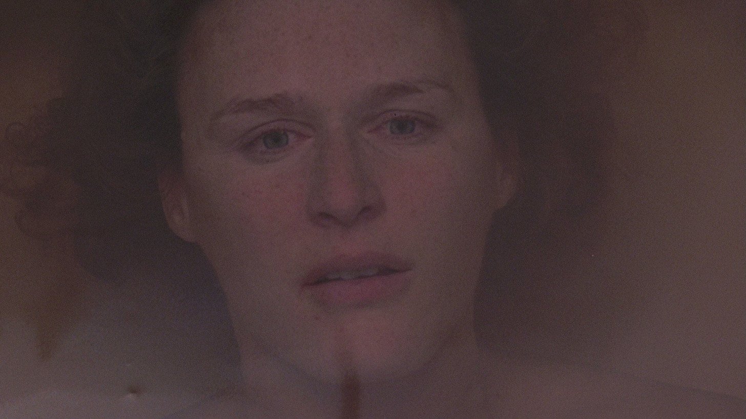 Glenn Close as Alex Forrest under an umbrella in the rain in Fatal Attraction 1987