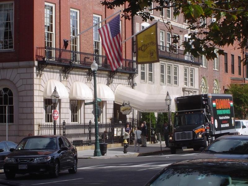 The real Bull and Finch Pub exterior on Beacon Street in Boston, the building used for the Cheers opening shot