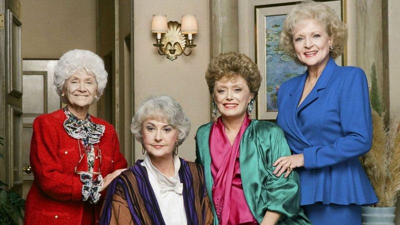 Golden Girls cast in colorful outfits promotional photo