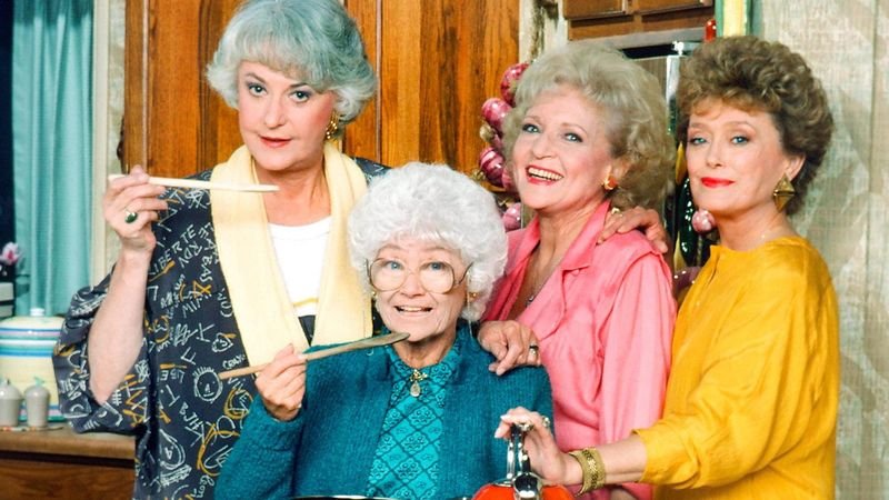 Golden Girls cast in kitchen cooking scene — one of the show's signature settings
