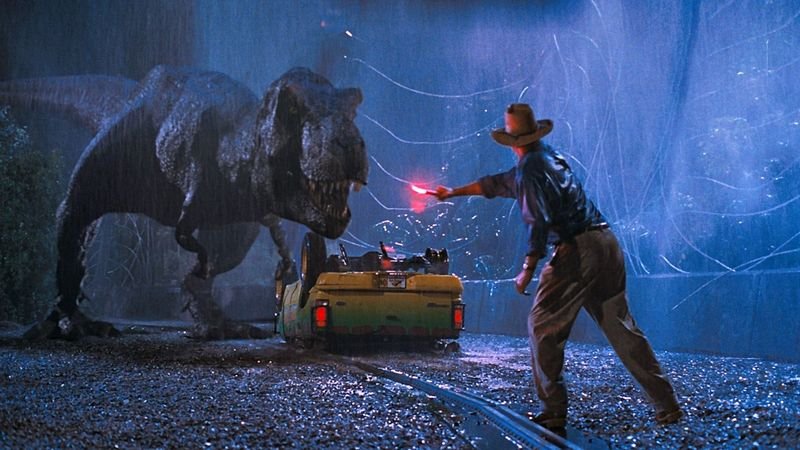 Jurassic Park 1993 T-Rex attack scene Sam Neill holding red flare in rain