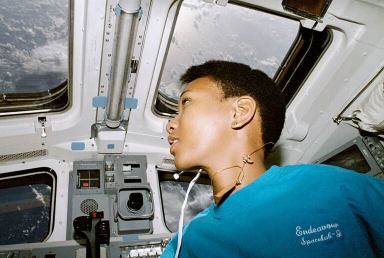 Mae Jemison looks out the flight deck of Space Shuttle Endeavour during STS-47 mission 1992