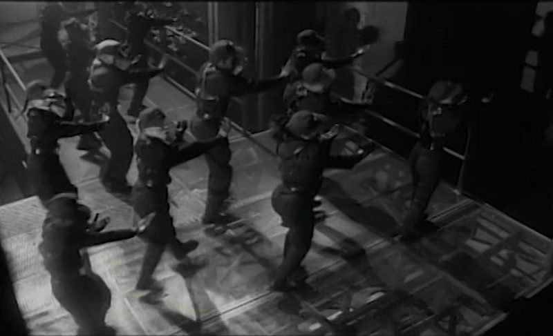 Dancers performing the Rhythm Nation choreography in the 1989 music video's warehouse set