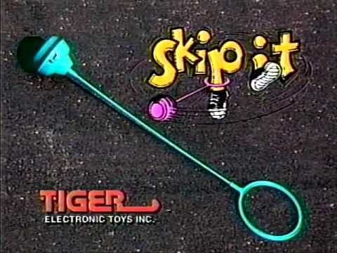 Green Skip-It toy with Tiger Electronic Toys Inc branding