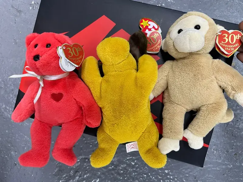 Modern 30th anniversary edition Beanie Babies bears and monkey with gold heart tags