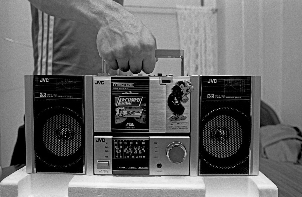 B-boy Mr Freeze stepping out with his boombox in the Bronx, early 1980s