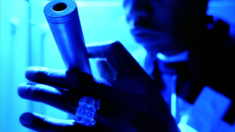 Belly 1998 movie stylized blue-lit gun closeup